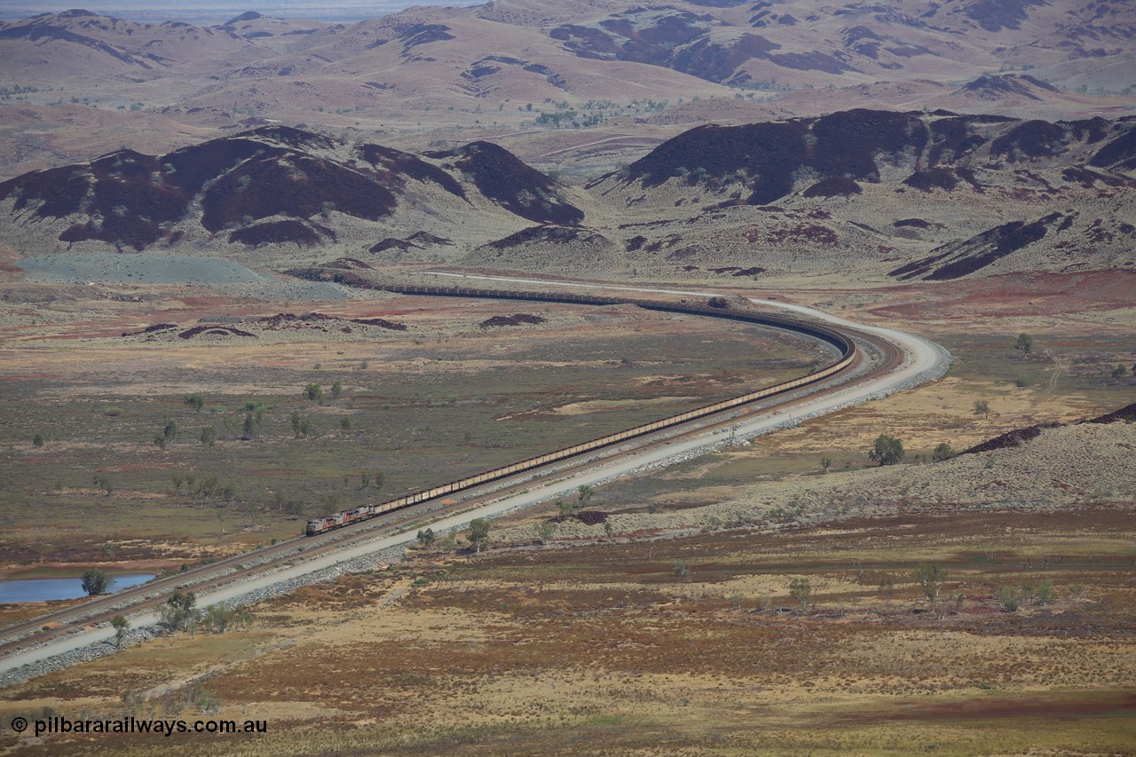 151111 9538
An empty train led by General Electric ES44DCi units 8162 serial 60226 and 8167 serial 60231 both in the Rio Tinto tiger strip livery leading Dash 9-44CW 7093 serial 47772, the last of the original build of Dash 9 units crossing Lake Poongkaliyarra.
Keywords: 8162;GE;ES44DCi;60226;