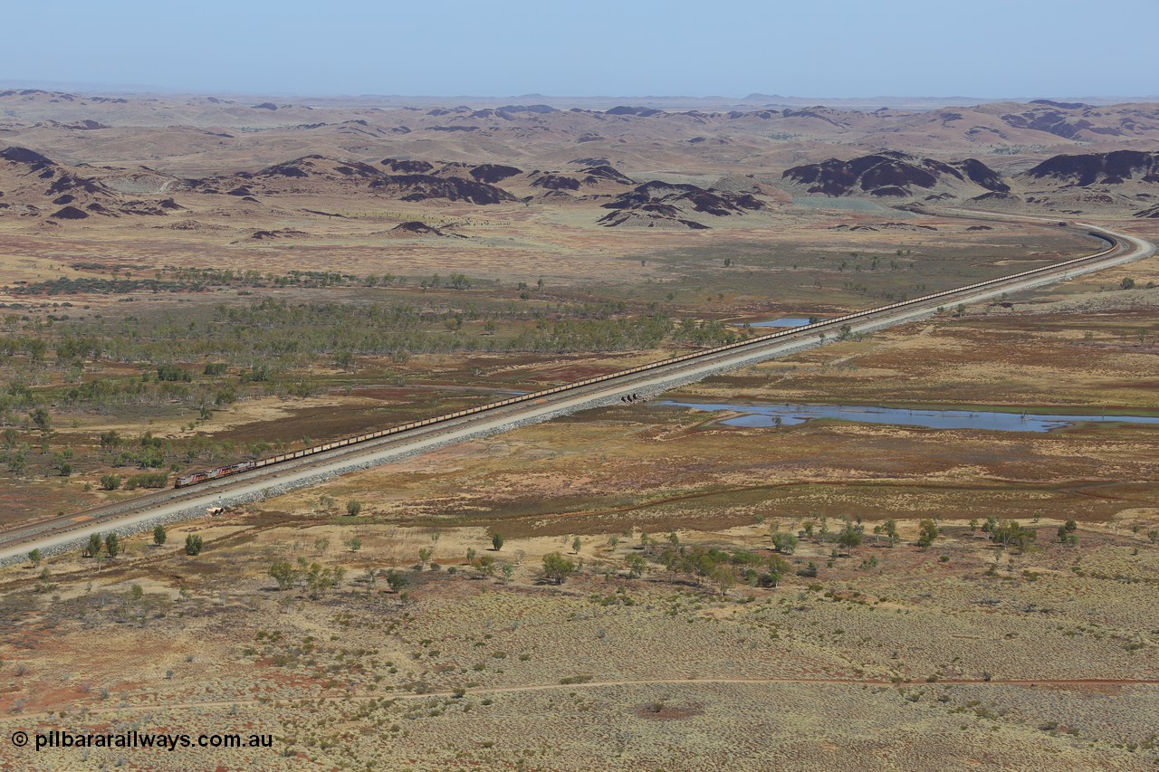 151111 9543
An empty train led by General Electric ES44DCi units 8162 serial 60226 and 8167 serial 60231 both in the Rio Tinto tiger strip livery leading Dash 9-44CW 7093 serial 47772, the last of the original build of Dash 9 units crossing Lake Poongkaliyarra.
Keywords: 8162;GE;ES44DCi;60226;