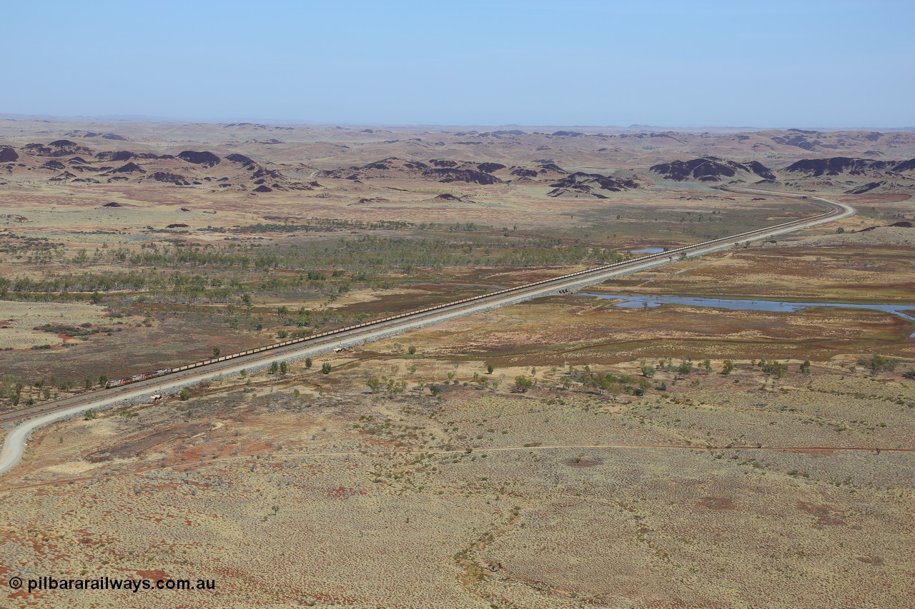 151111 9544
An empty train led by General Electric ES44DCi units 8162 serial 60226 and 8167 serial 60231 both in the Rio Tinto tiger strip livery leading Dash 9-44CW 7093 serial 47772, the last of the original build of Dash 9 units crossing Lake Poongkaliyarra.
Keywords: 8162;GE;ES44DCi;60226;