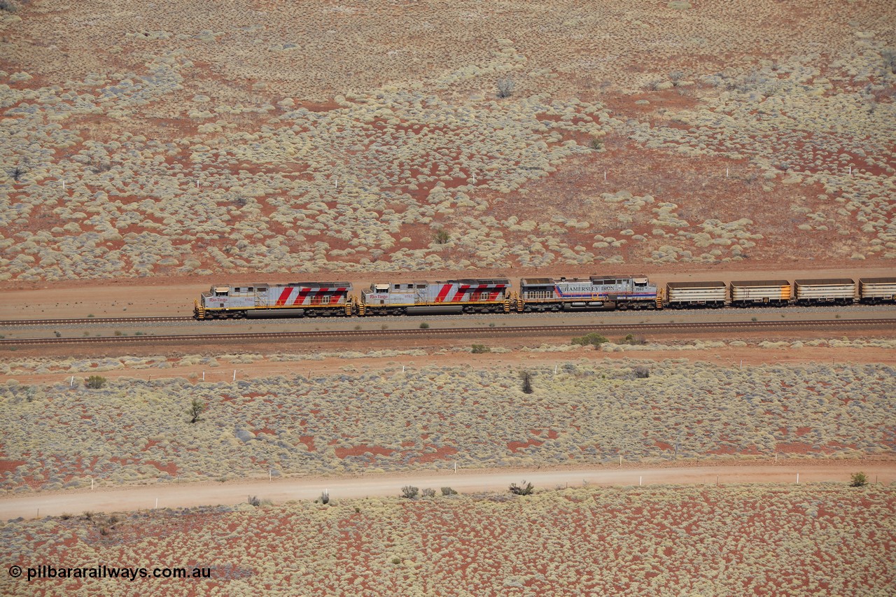 151111 9547
Side view of empty train led by General Electric ES44DCi units 8162 serial 60226 and 8167 serial 60231 both in the Rio Tinto tiger strip livery leading Dash 9-44CW 7093 serial 47772, the last of the original build of Dash 9 units at the 53 km.
Keywords: 8162;GE;ES44DCi;60226;