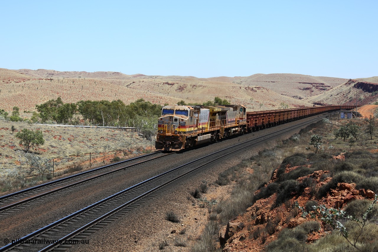 151111 9568
An empty train struggles upgrade at the 87.5 km post on the Tom Price line behind double General Electric Dash 9-44CW units 9403 serial 53457 wearing ROBE Pilbara Rail livery and 7087 serial 47766 wearing the original Hamersley Iron livery.
Keywords: 9403;GE;Dash-9-44CW;53457;