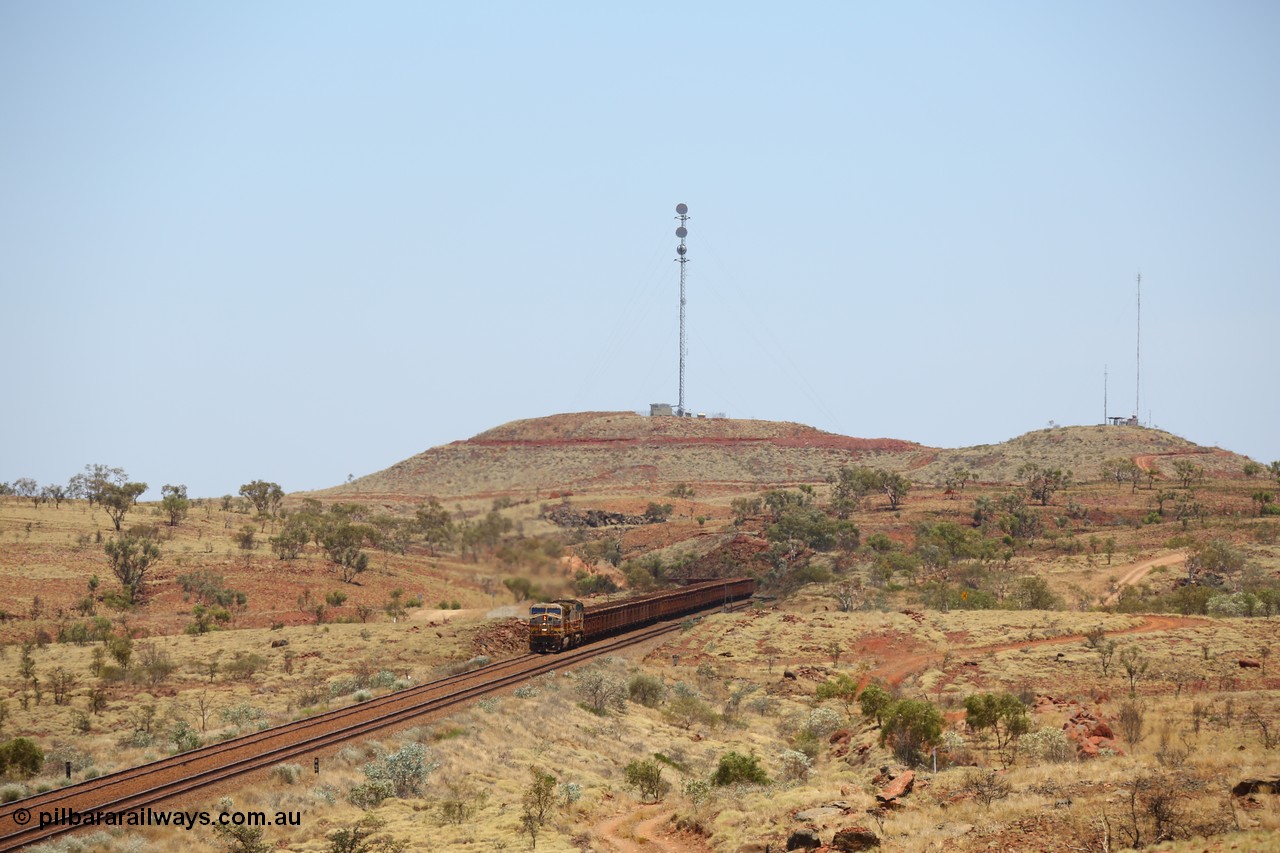 151111 9573
An empty train is still struggling upgrade at the 98 km post on the Tom Price line behind double General Electric Dash 9-44CW units 9403 serial 53457 wearing ROBE Pilbara Rail livery and 7087 serial 47766 wearing the original Hamersley Iron livery.
Keywords: 9403;GE;Dash-9-44CW;53457;