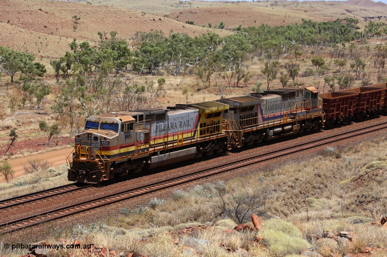 151111 9579
An empty train is still struggling upgrade at the 98 km post on the Tom Price line behind double General Electric Dash 9-44CW units 9403 serial 53457 wearing ROBE Pilbara Rail livery and 7087 serial 47766 wearing the original Hamersley Iron livery.
Keywords: 9403;GE;Dash-9-44CW;53457;