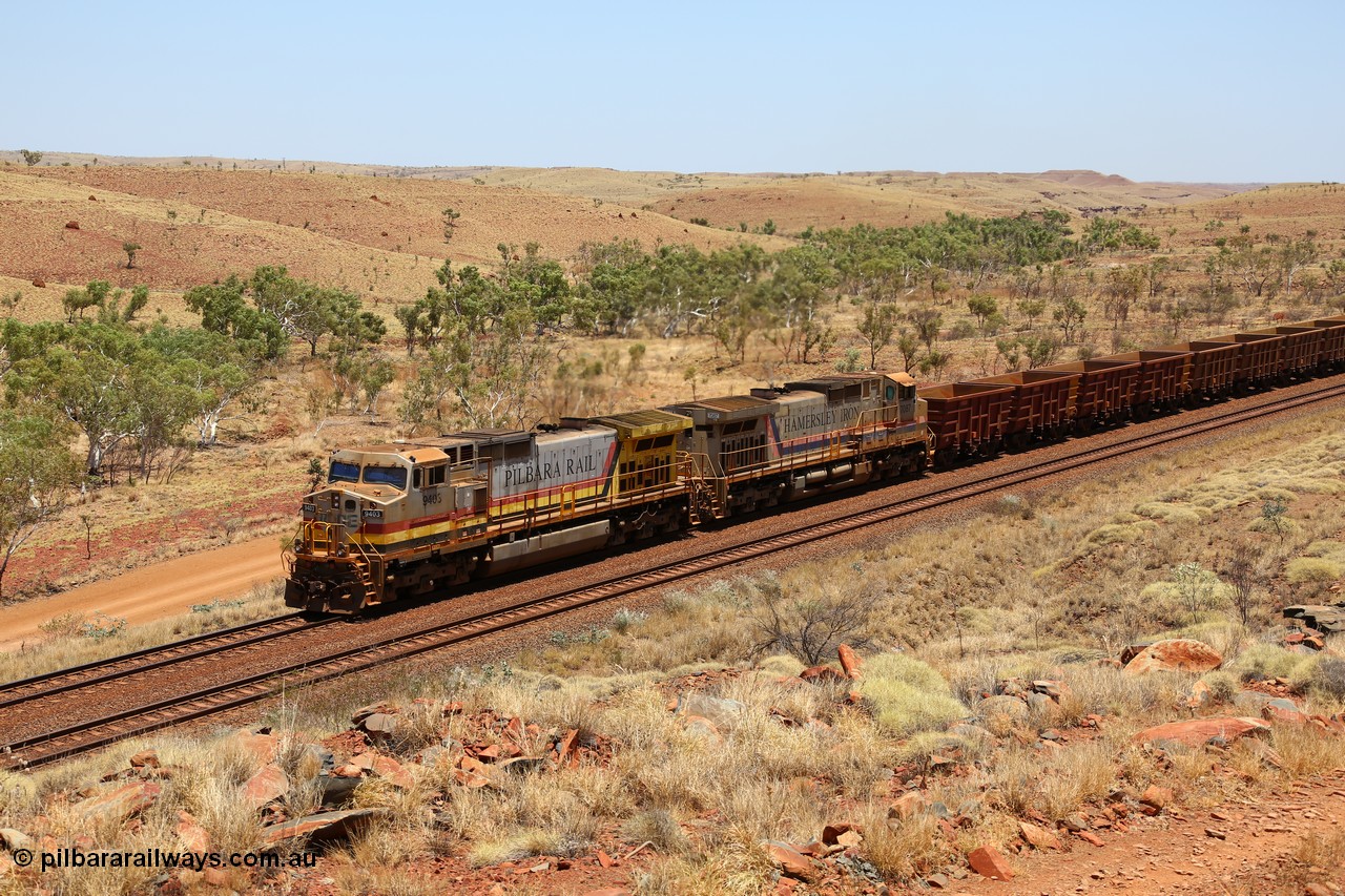 151111 9580
An empty train is still struggling upgrade at the 98 km post on the Tom Price line behind double General Electric Dash 9-44CW units 9403 serial 53457 wearing ROBE Pilbara Rail livery and 7087 serial 47766 wearing the original Hamersley Iron livery.
Keywords: 9403;GE;Dash-9-44CW;53457;
