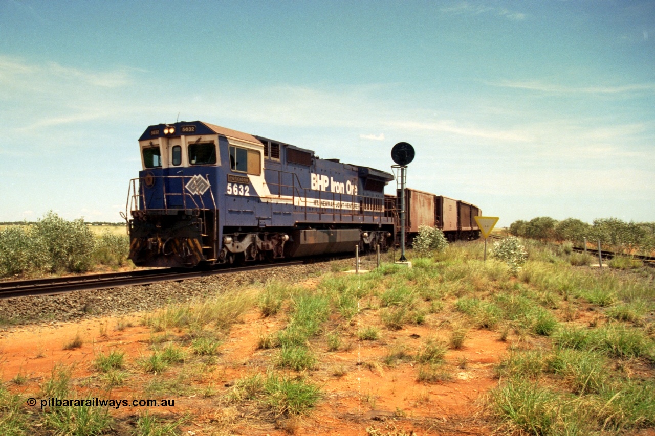 197-07
Goldsworthy Junction, looking west with the end of the triangle or wye, signal post is GJ 7, empty iron ore train behind BHP's Goninan 1988 build GE CM39-8 unit 5632 'Poseidon' serial 5831-11 / 88-081.
Keywords: 5632;Goninan;GE;CM39-8;5831-11/88-081;