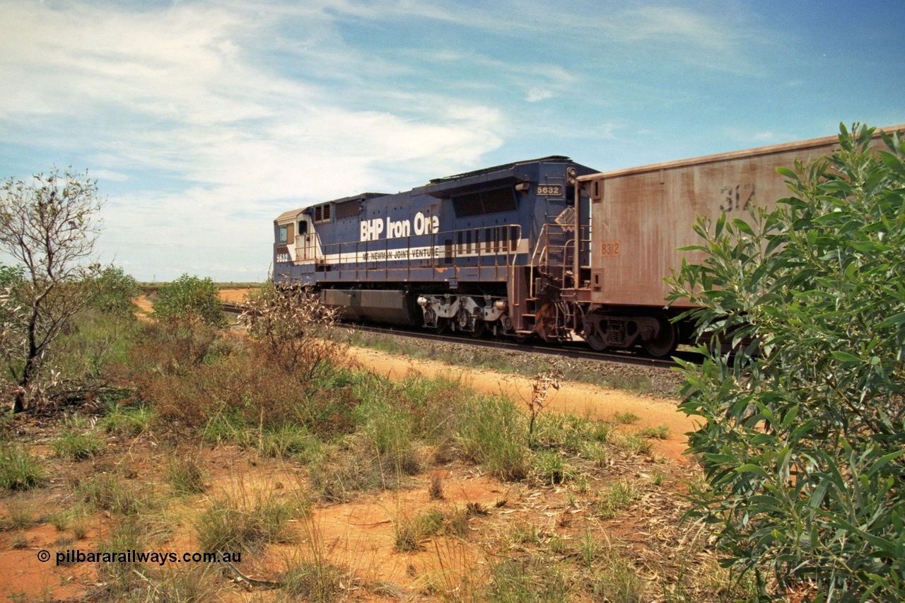 197-08
Goldsworthy Junction, looking east, empty iron ore train behind BHP's Goninan 1988 build GE CM39-8 unit 5632 'Poseidon' serial 5831-11 / 88-081, note the CCTV camera mounted under the radiator wing.
Keywords: 5632;Goninan;GE;CM39-8;5831-11/88-081;