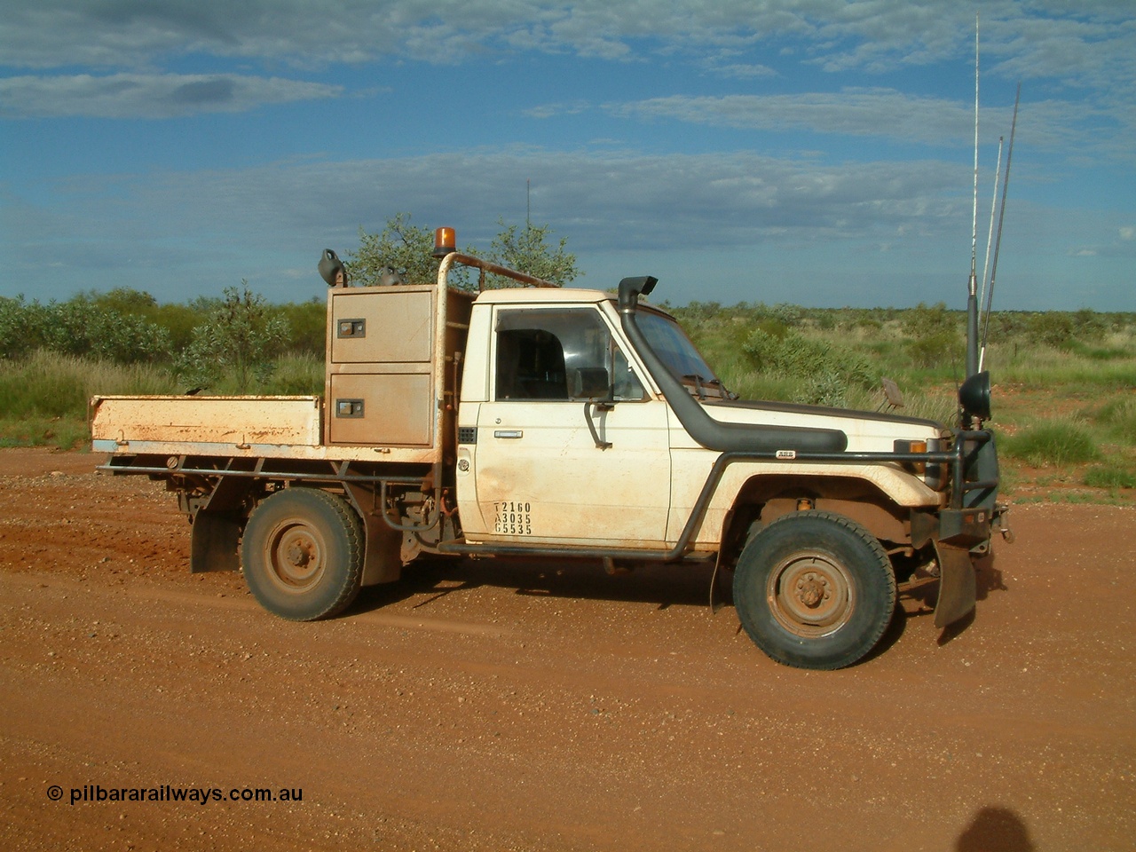040407 080354
Toy Titan on the lean when the LHS rear wheel parted company and went bush. 23 km Newman mainline. Wednesday 7th April 2004.
