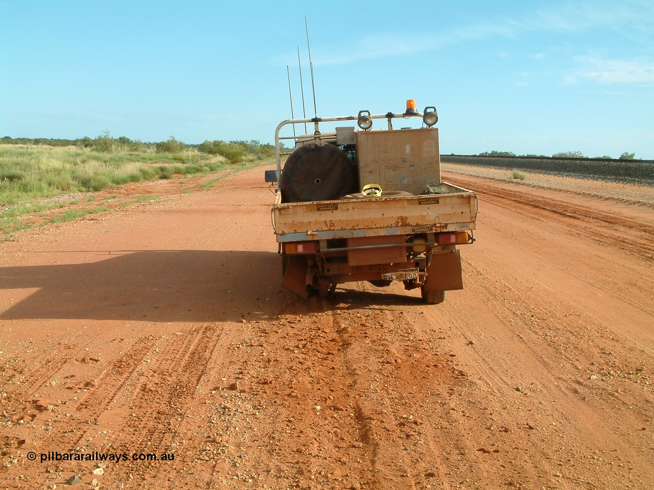 040407 080418
Toy Titan on the lean when the LHS rear wheel parted company and went bush. 23 km Newman mainline. Wednesday 7th April 2004.
