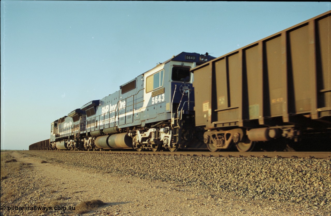 203-15
Bing Siding, a loaded BHP Iron Ore train with double Dash 8 power behind Goninan rebuilds to GE CM40-8M models 5660 'Kure' serial 8412-05 / 94-151 and sister 5643 'Mt Whaleback' serial no 8281-08 / 92-132 as run along the mainline past an empty train.
Keywords: 5643;Goninan;GE;CM40-8M;8281-08/92-132;rebuild;AE-Goodwin;ALCo;M636C;5470;G6047-2;
