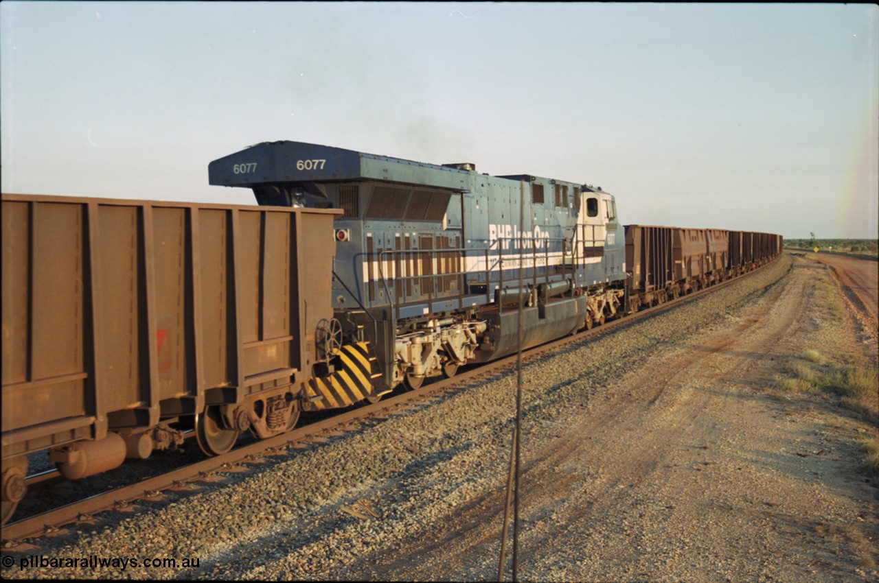 203-25
Bing Siding, min-train unit on an empty Yandi working BHP General Electric built AC6000 6077 'Nimingarra' serial 51069.
Keywords: 6077;GE;AC6000;51069;