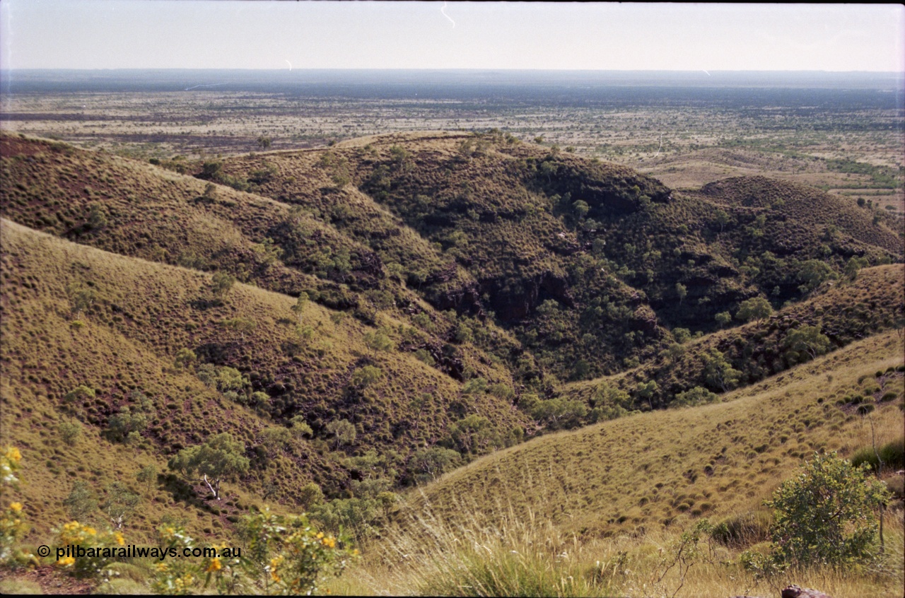 207-02
Koodaideri, view from saddleback looking north across the Fortescue Valley, Wittenoom - Roy Hill Rd can be seen if you know what to look for.

