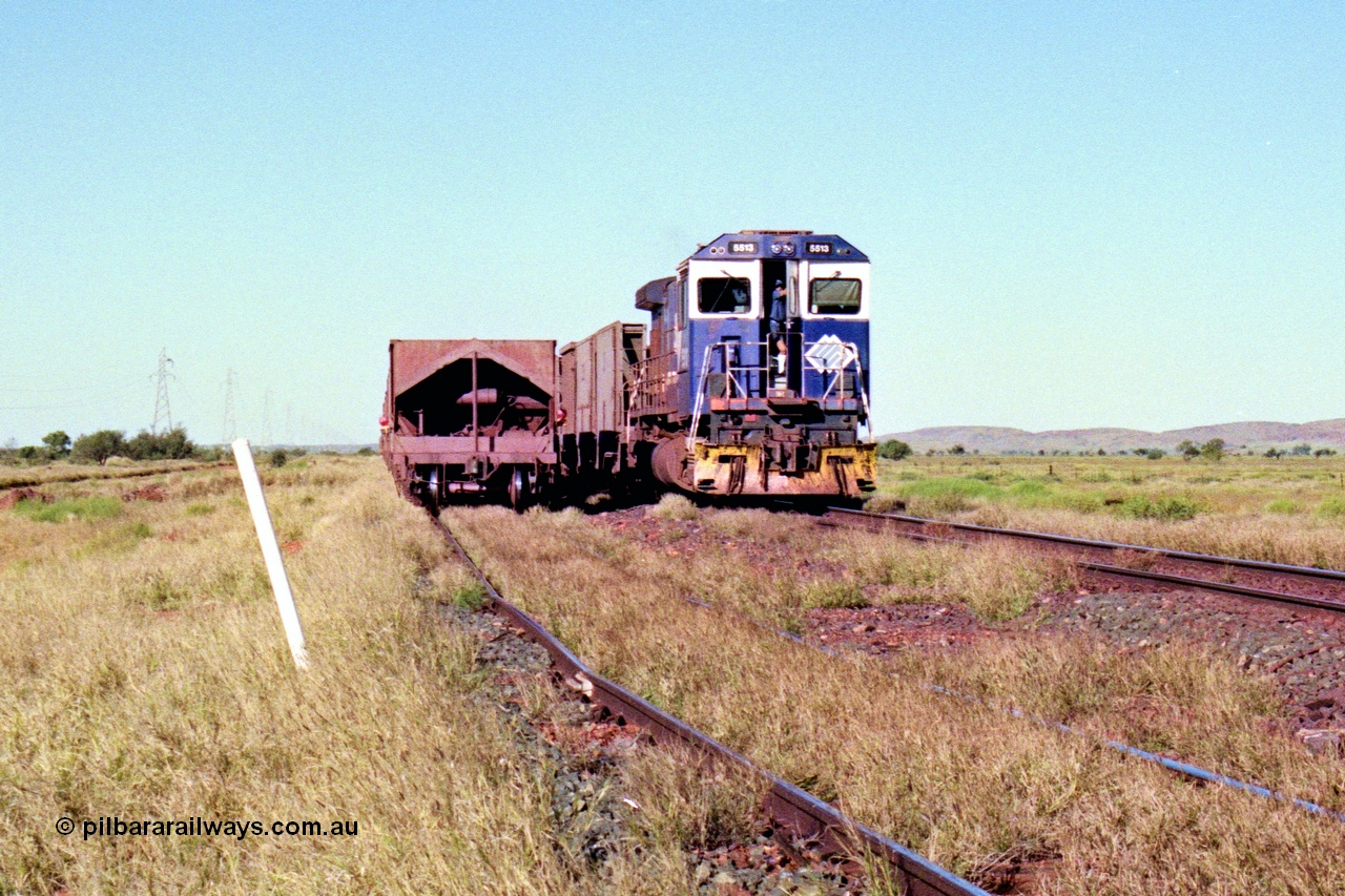 207-31
Hardie Siding, BHP locomotive 5513 is the final member of Goninan rebuilds from ALCo C636 5453 into a GE C36-7M serial 4839-02 / 88-078, cab front view, with rear of empty train in siding.
Keywords: 5513;Goninan;GE;C36-7M;4839-02/88-078;rebuild;AE-Goodwin;ALCo;C636;5453;G6012-2;
