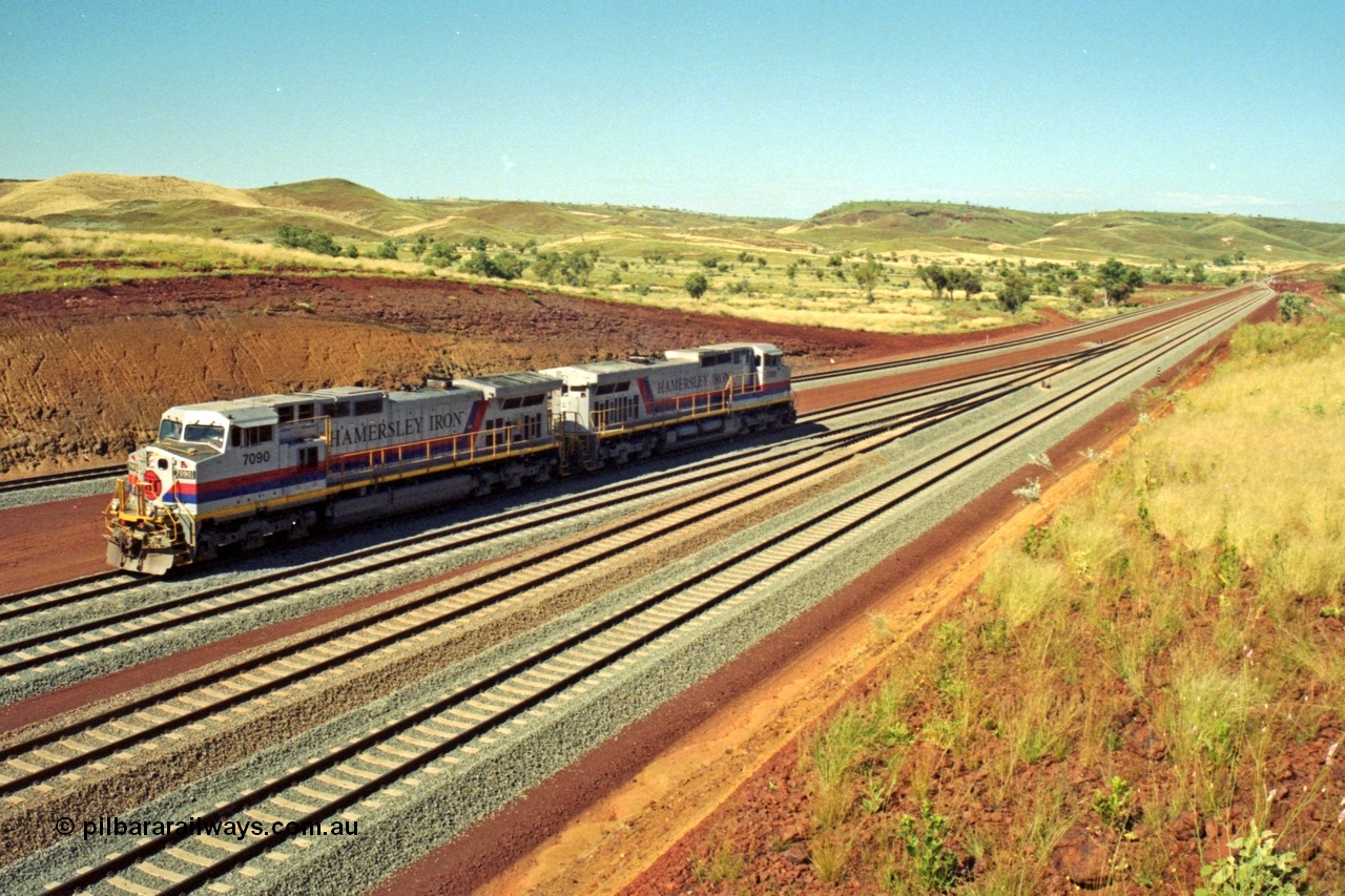 218-26
Yandicoogina or HIY as Hamersley Iron identify it, located 445 km from Parker Point yard in Dampier. Bank engine units General Electric Dash 9-44CW models 7090 serial 47769 and 7089 idle away waiting their next loaded train to push out.
Keywords: 7090;GE;Dash-9-44CW;47769;