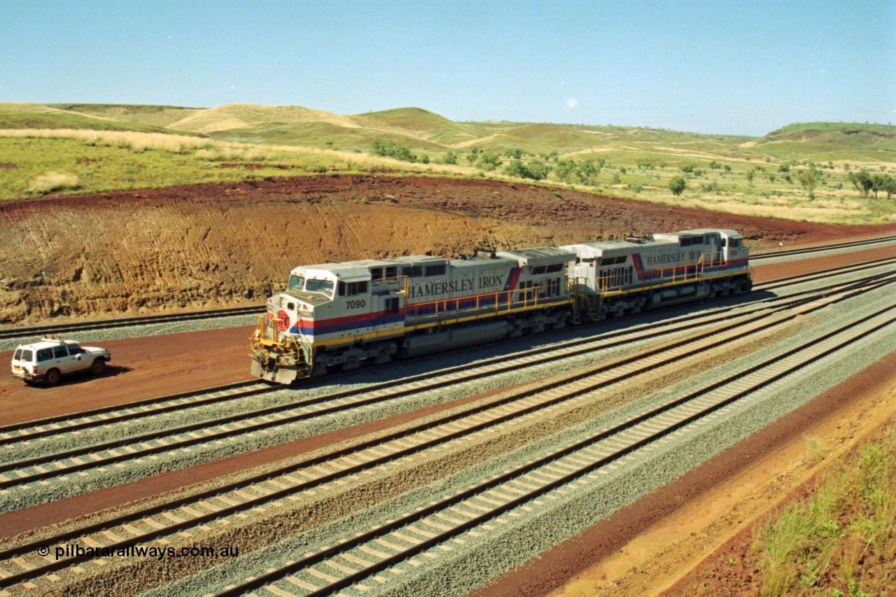 218-28
Yandicoogina or HIY as Hamersley Iron identify it, located 445 km from Parker Point yard in Dampier. Bank engine units General Electric Dash 9-44CW models 7090 serial 47769 and 7089 idle away waiting their next loaded train to push out.
Keywords: 7090;GE;Dash-9-44CW;47769;