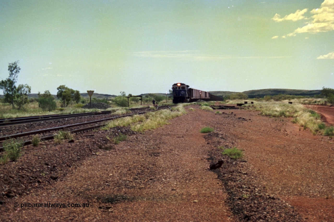 219-23
Goldsworthy Siding, C36-7M unit 5507 'Nimingarra' serial 4839-03 / 87-072, an original Mt Newman Mining ALCo C636 5461 to GE C36-7M rebuild carried out by Goninan, leads an empty train into the siding at Goldsworthy as the second driver sets the road.
Keywords: 5507;Goninan;GE;C36-7M;4839-03/87-072;rebuild;AE-Goodwin;ALCo;C636;5461;G6035-2;
