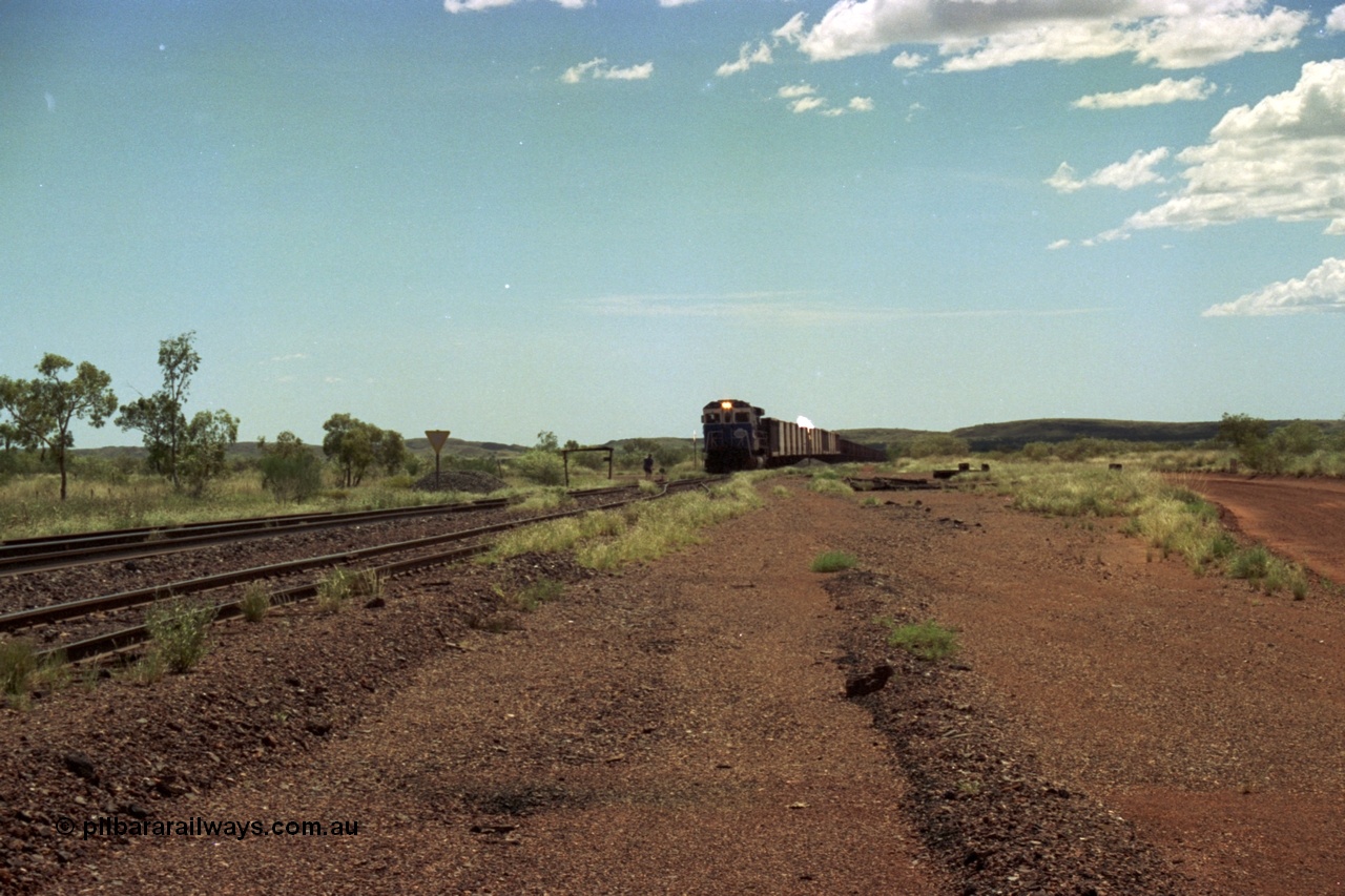 219-24
Goldsworthy Siding, C36-7M unit 5507 'Nimingarra' serial 4839-03 / 87-072, an original Mt Newman Mining ALCo C636 5461 to GE C36-7M rebuild carried out by Goninan, leads an empty train into the siding at Goldsworthy as the second driver sets the road.
Keywords: 5507;Goninan;GE;C36-7M;4839-03/87-072;rebuild;AE-Goodwin;ALCo;C636;5461;G6035-2;