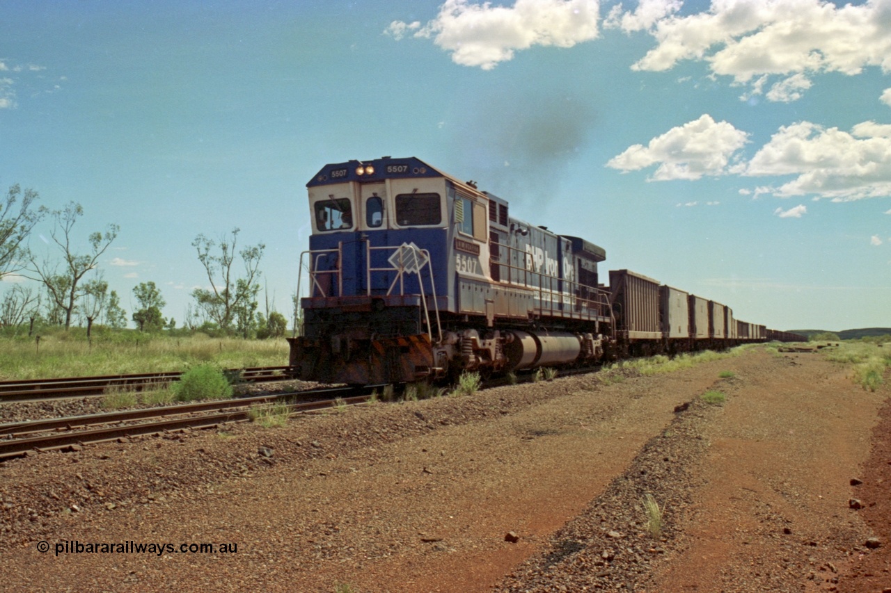 219-28
Goldsworthy Siding, C36-7M unit 5507 'Nimingarra' serial 4839-03 / 87-072, an original Mt Newman Mining ALCo C636 5461 to GE C36-7M rebuild carried out by Goninan, leads an empty train along the siding for a meet.
Keywords: 5507;Goninan;GE;C36-7M;4839-03/87-072;rebuild;AE-Goodwin;ALCo;C636;5461;G6035-2;