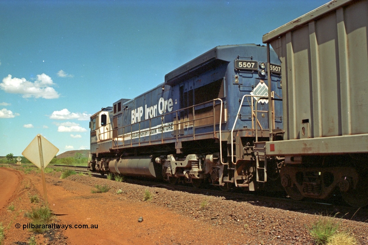 219-30
Goldsworthy Siding, C36-7M unit 5507 'Nimingarra' serial 4839-03 / 87-072, an original Mt Newman Mining ALCo C636 5461 to GE C36-7M rebuild carried out by Goninan, leads an empty train along the siding at Goldsworthy to cross a loaded.
Keywords: 5507;Goninan;GE;C36-7M;4839-03/87-072;rebuild;AE-Goodwin;ALCo;C636;5461;G6035-2;