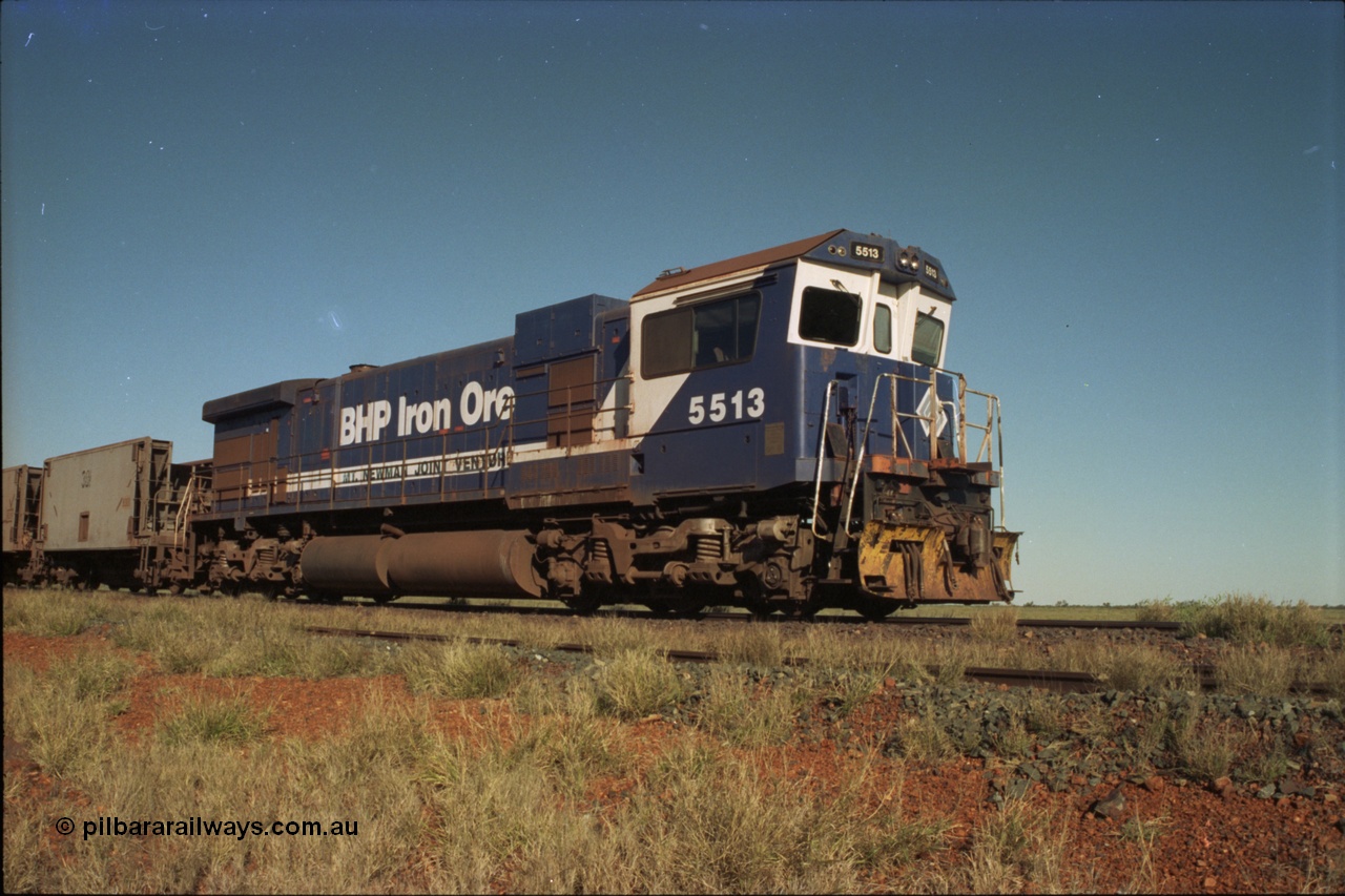 221-02
Hardie Siding, with the days of C36-7M operations numbered, Goninan rebuild 5513 serial 88-078 / 4839-02 from ALCo C636 5453 holds the mainline with a loaded train bound for Finucane Island.
Keywords: 5513;Goninan;GE;C36-7M;4839-02/88-078;rebuild;AE-Goodwin;ALCo;C636;5453;G6012-2;