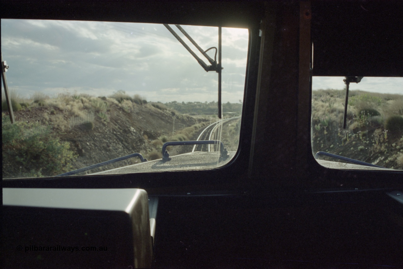 221-35
Yandi One mine loadout balloon loop, view out the cab window from near new General Electric AC6000 unit 6074 serial 51066.
Keywords: 6074;GE;AC6000;51066;