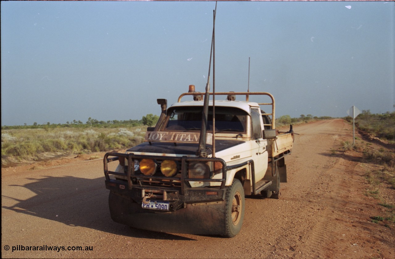 222-11
BHP access road, the Toy Titan has suffered another flat tyre.
