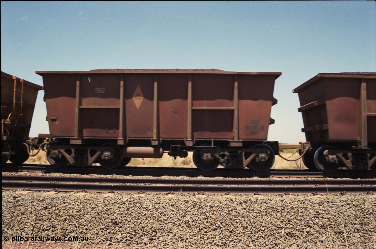 222-37
Loaded Hamersley Iron Comeng NSW built ore waggon 562, one of a batch of 150 built in 1968.
Keywords: Comeng-NSW;HI-ore-waggon;