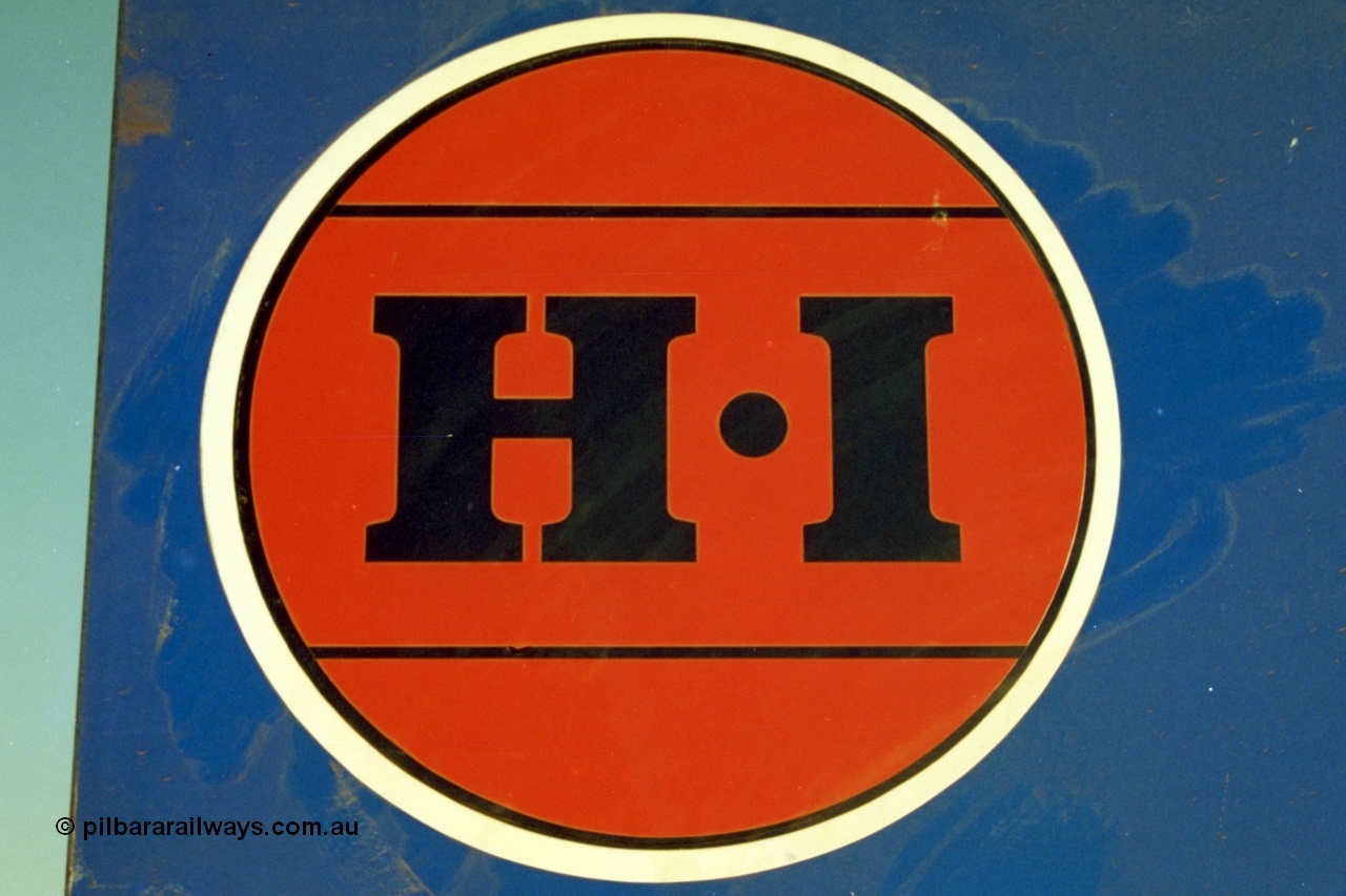 223-01
The HI red dot logo for Hamersley Iron on a sign near Rosella Siding. 21st October 2000.

