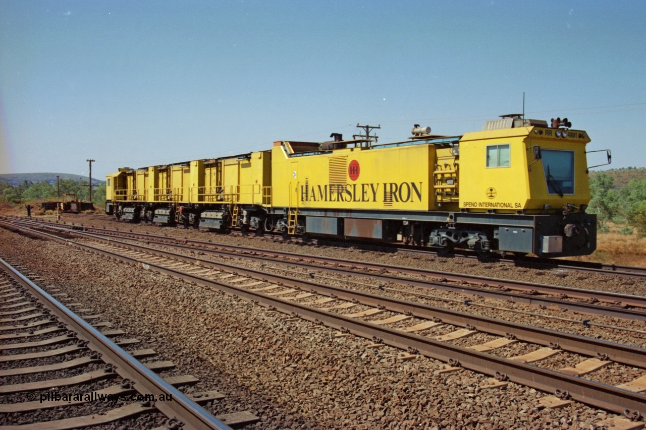 223-09
Possum Siding, Hamersley Iron rail grinder, Speno built RR 48 M-1 model sits in the back track siding. 21st October 2000.
Keywords: Speno;RR48;M1;rail-grinder;