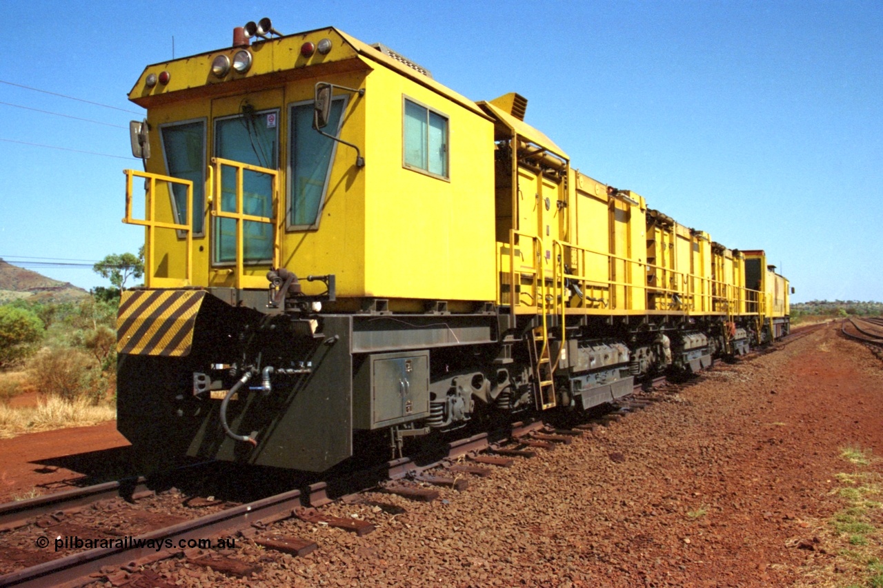 223-10
Possum Siding, Hamersley Iron rail grinder, Speno built RR 48 M-1 model sits in the back track siding. 21st October 2000.
Keywords: Speno;RR48;M1;rail-grinder;