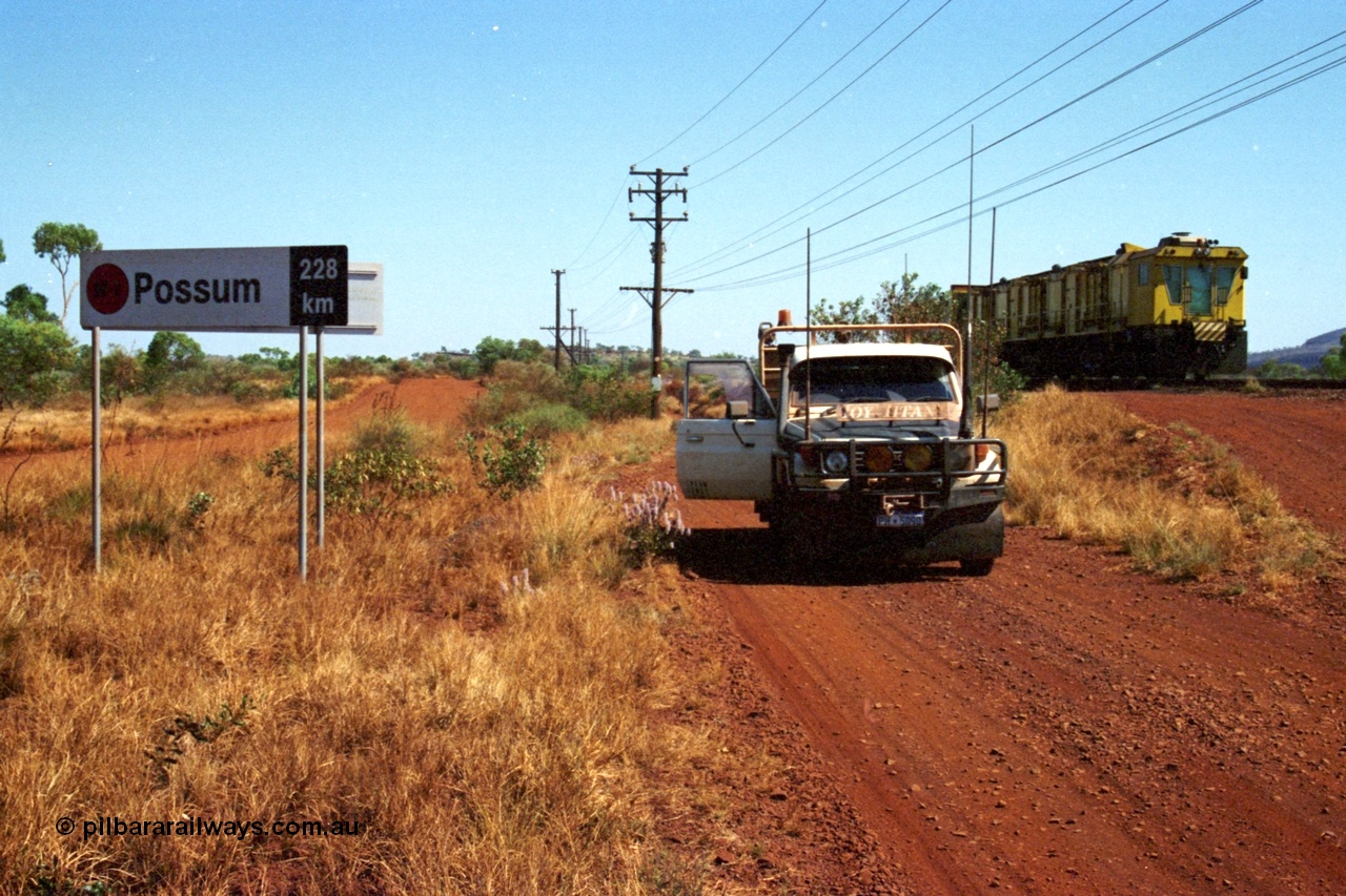 223-11
Possum Siding sign on the Hamersley Iron Dampier to Paraburdoo line, located 228 km from Dampier. 21st October 2000.
