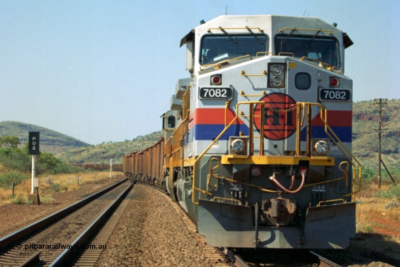 223-21
Possum Siding, Hamersley Iron loco 7082 a General Electric built Dash 9-44CW serial 47761 leads sister unit 7080 with an empty train just inside the loop waiting to effect a crew change. 21st October 2000.
Keywords: 7082;GE;Dash-9-44CW;47761;