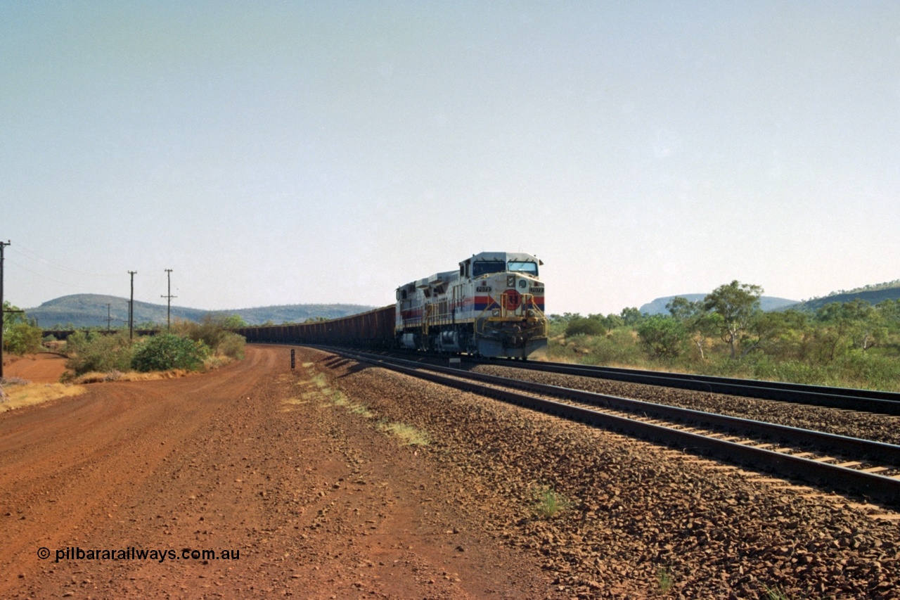 223-35
Possum Siding 227 km, a loaded train behind a pair of Hamersley Iron General Electric built Dash 9-44CW units 7072 serial 47751 and 7074 serial 47753 on a loaded train ex Marandoo holds the mainline awaiting clearance north. 21st October 2000.
Keywords: 7072;GE;Dash-9-44CW;47751;