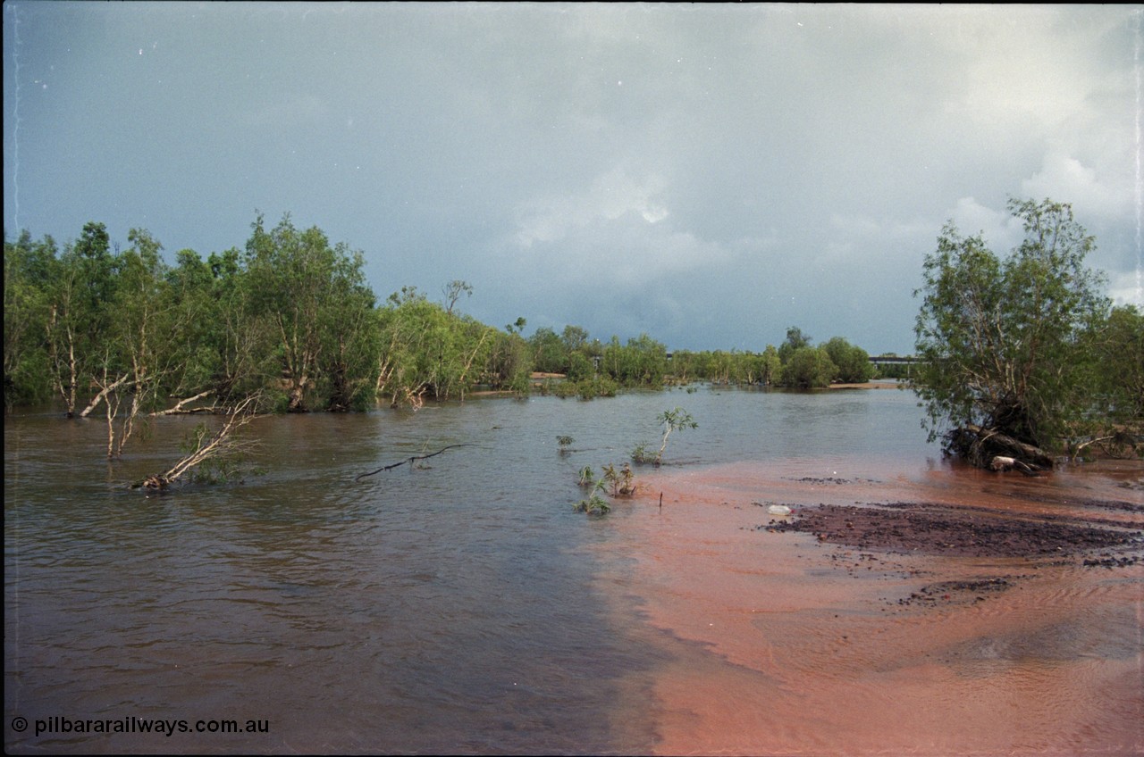 225-00
Walla siding area, the East Turner River is in flood, flowing with the bridge at the 55.5 km in the background.
