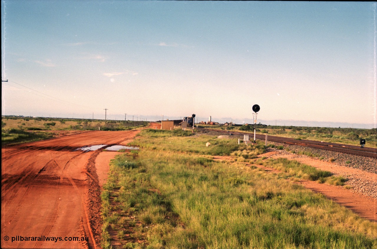 225-03
Bing siding, the afternoon empty train to Yandi was a double AC6000, 112 waggons, AC6000 and 112 waggons for a long time, here's one on approach. Flashbutt yard is to the right. [url=https://goo.gl/maps/r3bVfZz8aJS2]GeoData[/url].
