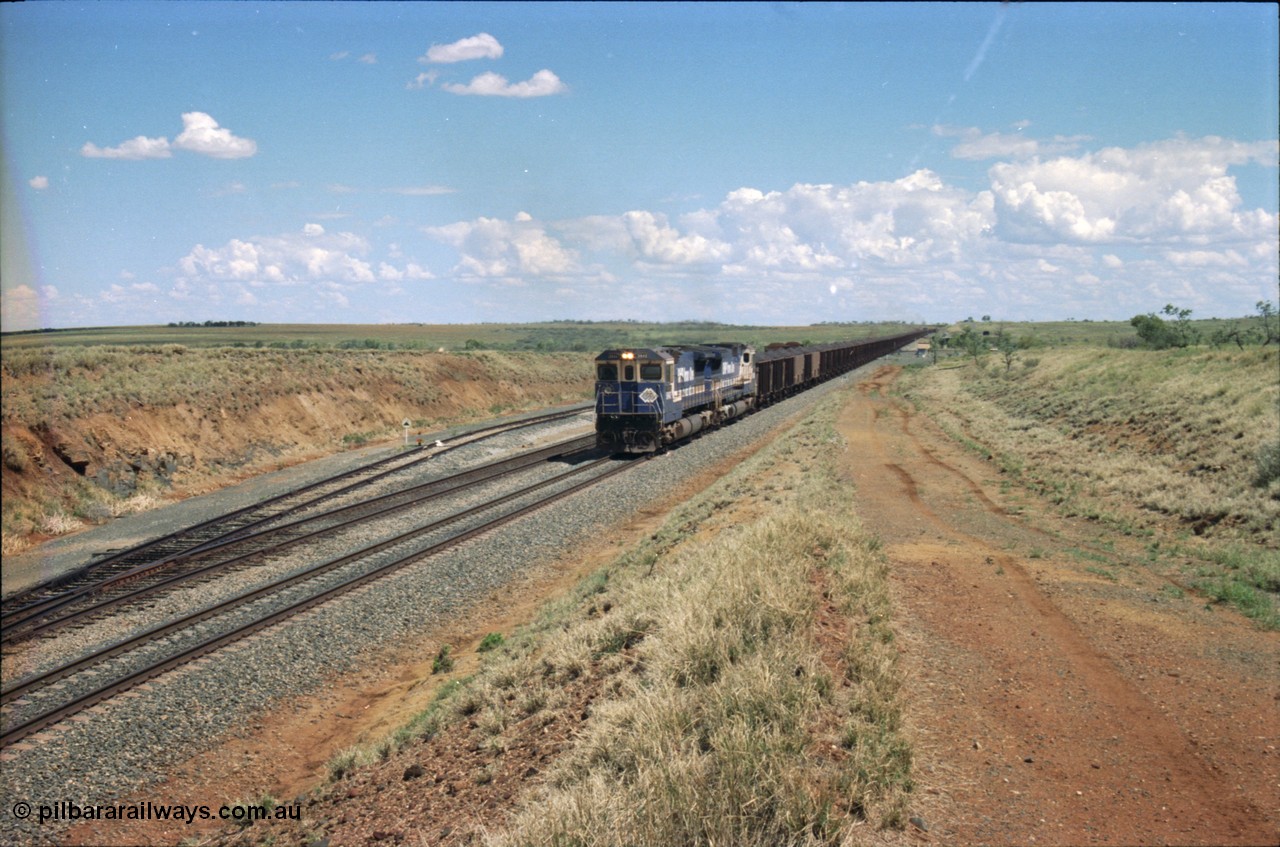 226-26
Shaw siding at the 219 km a loaded train with power from two Goninan CM40-8M GE rebuild units 5642 'Wallareenya' serial 8281-07 / 92-131 and sister unit 5636, the mid-train remotes can be seen in the distance topping the grade. [url=https://goo.gl/maps/JLjSYskHScU2]GeoData[/url].
Keywords: 5642;Goninan;GE;CM40-8M;8281-07/92-131;rebuild;AE-Goodwin;ALCo;C636;5467;G6041-3;