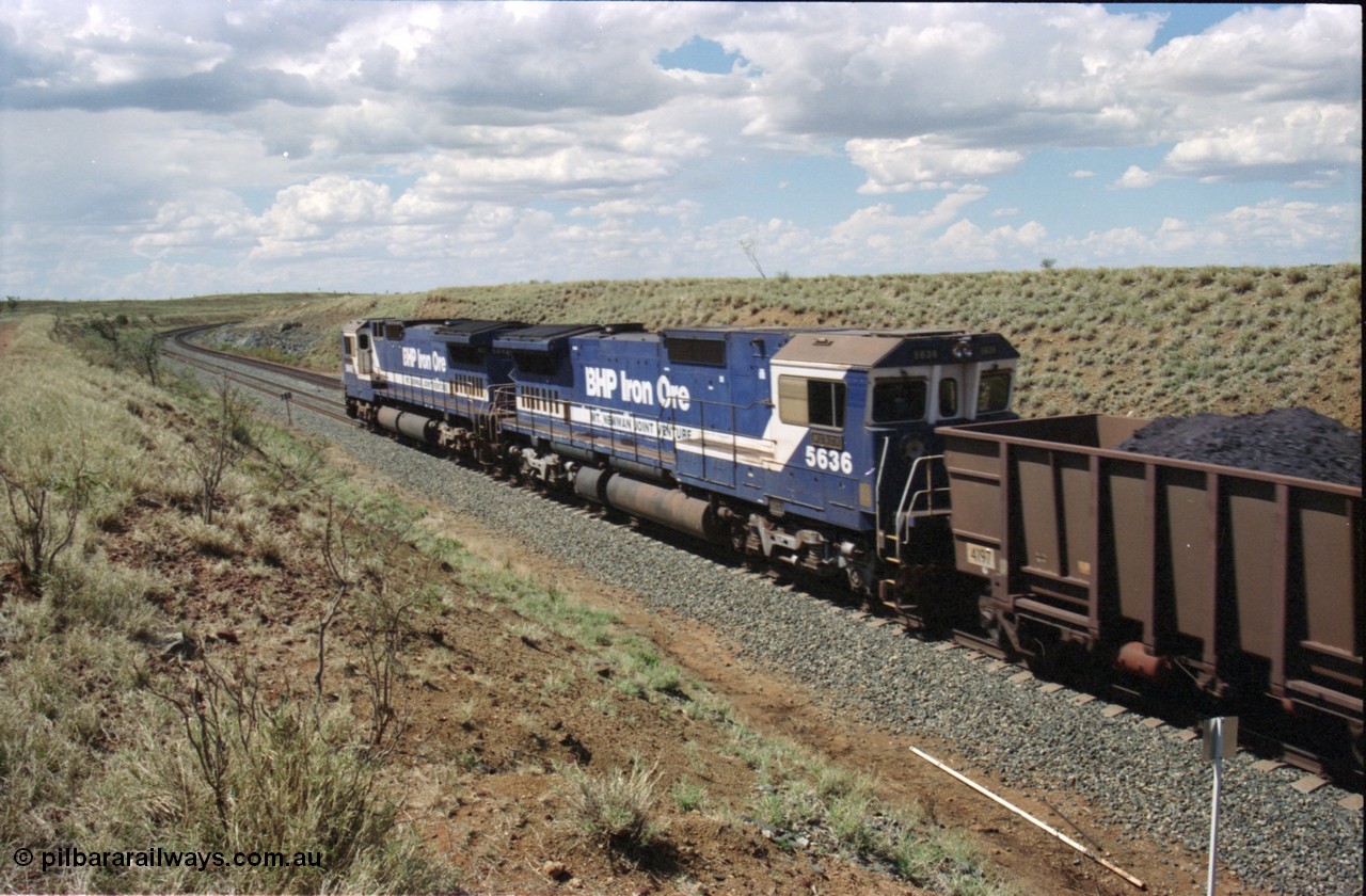 226-29
Shaw siding, the loaded train is winning the climb as second unit 5636 'Munda' serial 8151-11 / 91-122 another Goninan CM40-8M GE rebuild assists in powering the train to port. [url=https://goo.gl/maps/JLjSYskHScU2]GeoData[/url].
Keywords: 5636;Goninan;GE;CM40-8M;8151-11/91-122;rebuild;AE-Goodwin;ALCo;C636;5462;G6035-3;