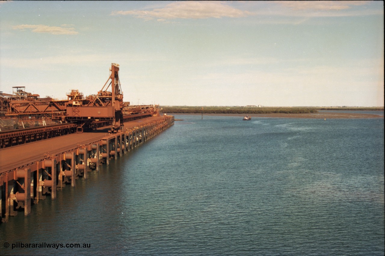 227-05
Nelson Point, view along B berth with Shiploader 1, this loader has since been replaced. In the distance now are berths E and F, Redbank Powerstation can be seen in the distance. [url=https://goo.gl/maps/9YFk9Z8c7WG2]GeoData[/url].
