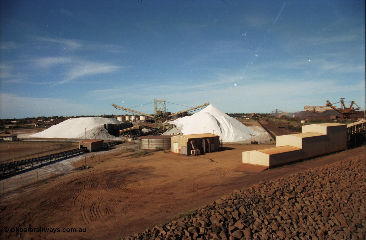227-10
Nelson Point, a view from the rear of A berth at the salt pile and stacker, this was operated by Cargill at the time of the photo. The under harbour tunnel portal is on the right. [url=https://goo.gl/maps/1sLxDMF5tZu]GeoData[/url].
