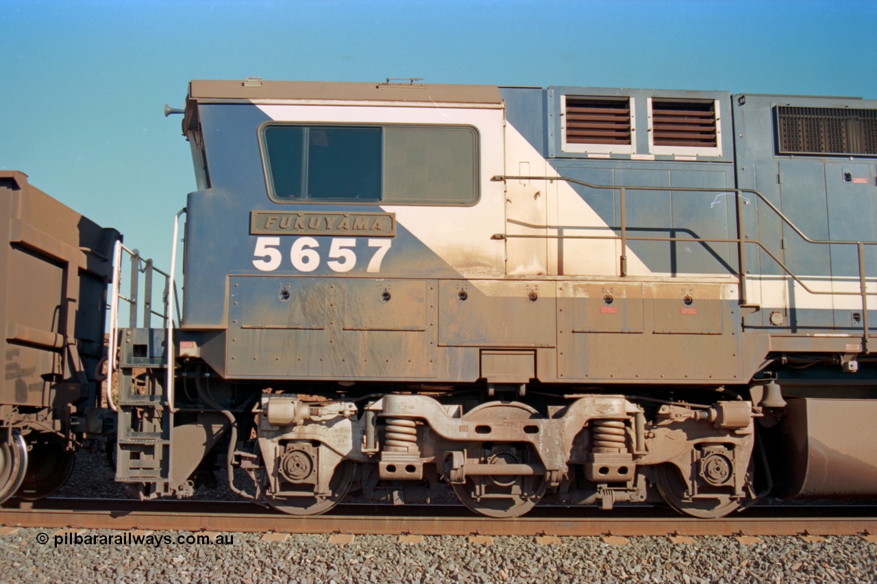 229-12
Yandi Two at the 311.5 km, empty BHP train mid-train Goninan rebuild CM40-8M GE units 5657 'Fukuyama' serial 8412-02 / 94-148 trailing remote unit, cab side. [url=https://goo.gl/maps/DcycDGojcBt]GeoData[/url].
Keywords: 5657;Goninan;GE;CM40-8M;8412-02/94-148;rebuild;Comeng-NSW;ALCo;M636C;5492;C6084-8;