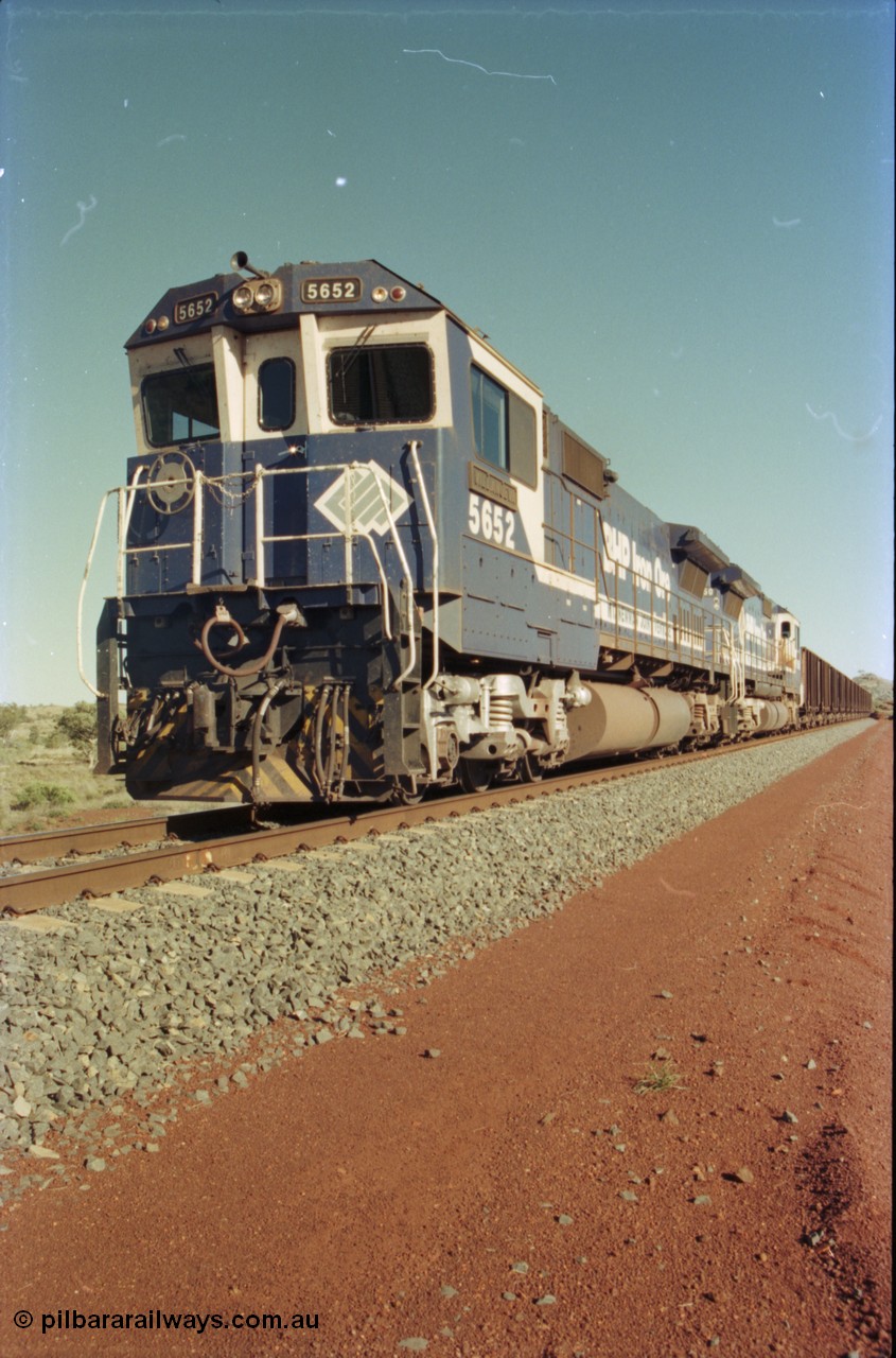 231-12
Yandi Two balloon loop, BHP Iron Ore 5652 'Villanueva' serial 8412-09 / 93-143 an Goninan WA rebuild CM40-8M GE unit loads a train at 1.2 km/h with second unit 5650. [url=https://goo.gl/maps/3vQHZqBXNa32]GeoData[/url].
Keywords: 5652;Goninan;GE;CM40-8M;8412-09/93-143;rebuild;AE-Goodwin;ALCo;M636C;5482;G6061-3;