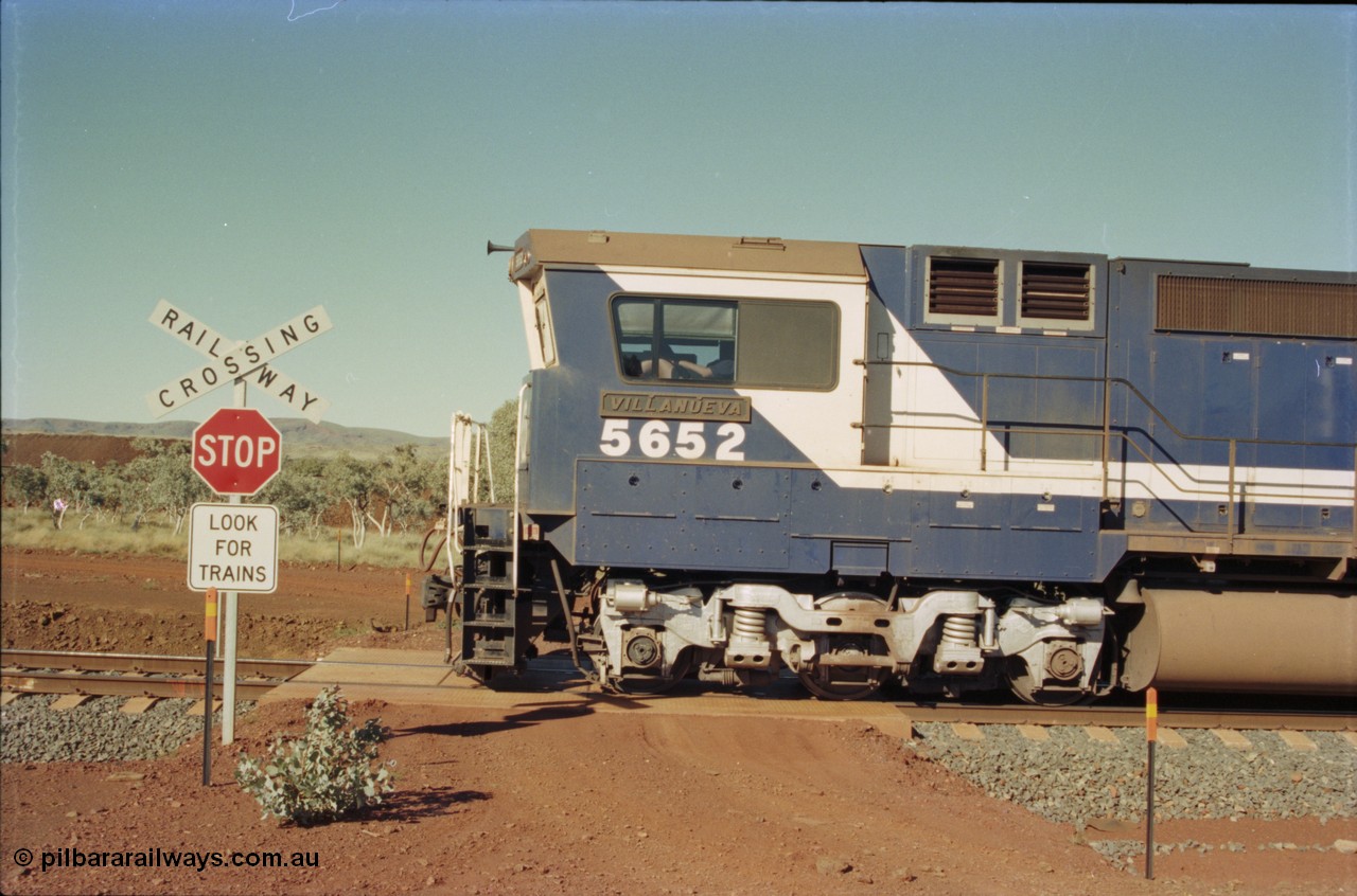 231-32
Yandi Two balloon loop 316.2 km grade crossing, BHP Iron Ore 5652 'Villanueva' serial 8412-09 / 93-143 an Goninan WA rebuild CM40-8M GE unit loads a train at 1.2 km/h as it runs across the crossing. [url=https://goo.gl/maps/N6VUeKeBS682]GeoData[/url].
Keywords: 5652;Goninan;GE;CM40-8M;8412-09/93-143;rebuild;AE-Goodwin;ALCo;M636C;5482;G6061-3;
