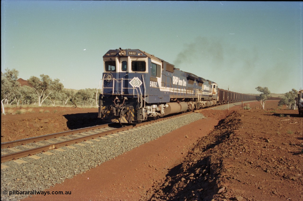 231-36
Yandi Two balloon loop 316.2 km grade crossing, BHP Iron Ore 5652 'Villanueva' serial 8412-09 / 93-143 an Goninan WA rebuild CM40-8M GE unit loads a train at 1.2 km/h with second unit 5650. [url=https://goo.gl/maps/N6VUeKeBS682]GeoData[/url].
Keywords: 5652;Goninan;GE;CM40-8M;8412-09/93-143;rebuild;AE-Goodwin;ALCo;M636C;5482;G6061-3;