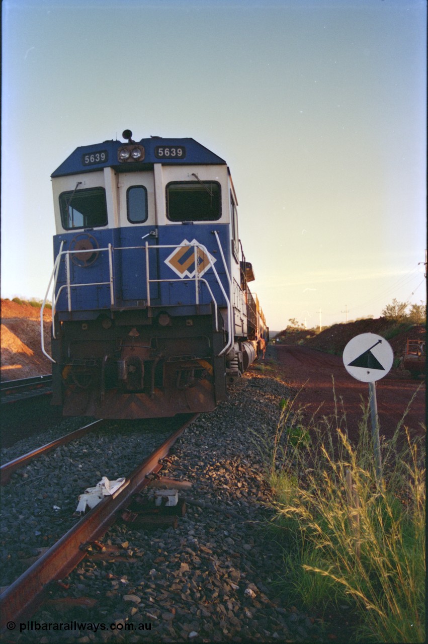 232-17
Yandi One backtrack, following a cyclone shutdown of the mainline and severe flooding around Yandi a 'mixed' freight train was operated to Yandi to deliver food, mail and diesel fuel to the mine and camp. Here BHP Iron Ore CM40-8M unit 5639 'Corunna Downs' serial 8281-03 / 92-128 idles away in the backtrack awaiting its path back to Port Hedland with flat waggon 6703, four fuel tank waggons and a broken ore waggon. February 1997. [url=https://goo.gl/maps/6c1WFqjYSg42]GeoData[/url].
Keywords: 5639;Goninan;GE;CM40-8M;8281-03/92-128;rebuild;AE-Goodwin;ALCo;C636;5459;G6027-3;