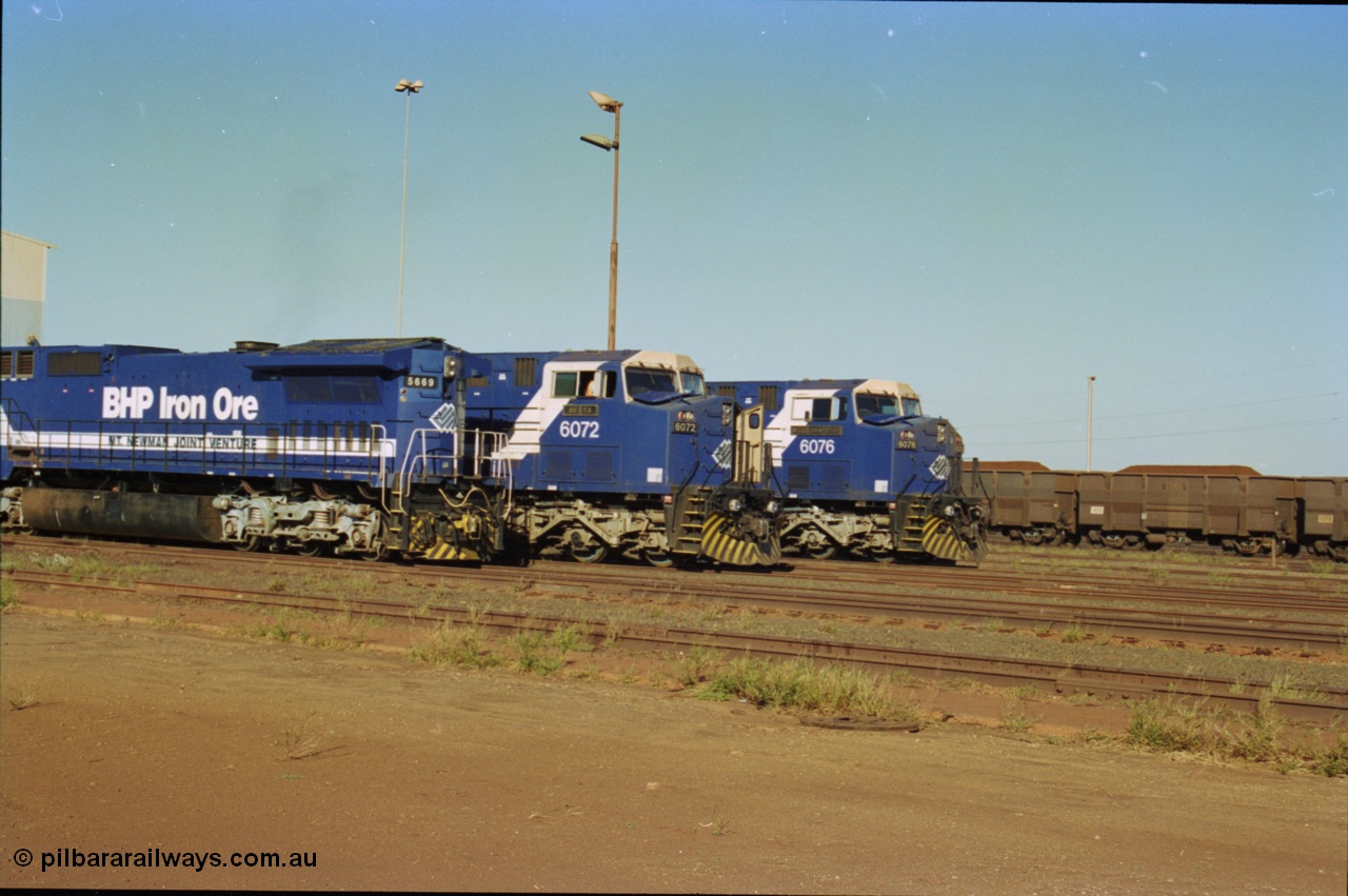 236-24
Nelson Point Loco Overhaul Shop, BHP Iron Ore's Goninan GE rebuilt CM40-8MEFI unit 5669 'Beilun' serial 8412-02 / 95-160 sits out the front awaiting attention, with AC6000 units 6072 being driven out and 6077 beside it.
Keywords: 5669;Goninan;GE;CM40-8EFI;8412-02/95-160;rebuild;Comeng-NSW;ALCo;M636C;5486;C6084-2;