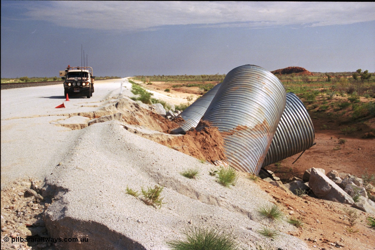 237-03
Water damaged culverts located on the upper reaches of the Edgina Creek, near the Woodstock South location on the BHP Newman line. [url=https://goo.gl/maps/kRVDYtxmRC42] Geo Data [/url].

