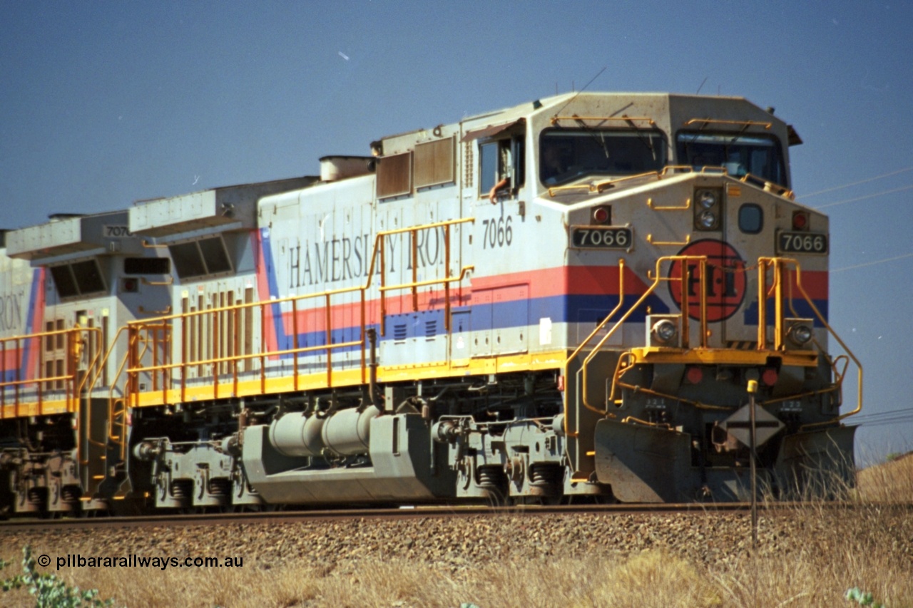 237-36
Dugite Siding, empty train in the passing track behind Hamersley Iron General Electric model Dash 9-44CW unit 7066 with serial 47745. [url=https://goo.gl/maps/6og1H2khBAu] Geodata [/url].
Keywords: 7066;GE;Dash-9-44CW;47745;