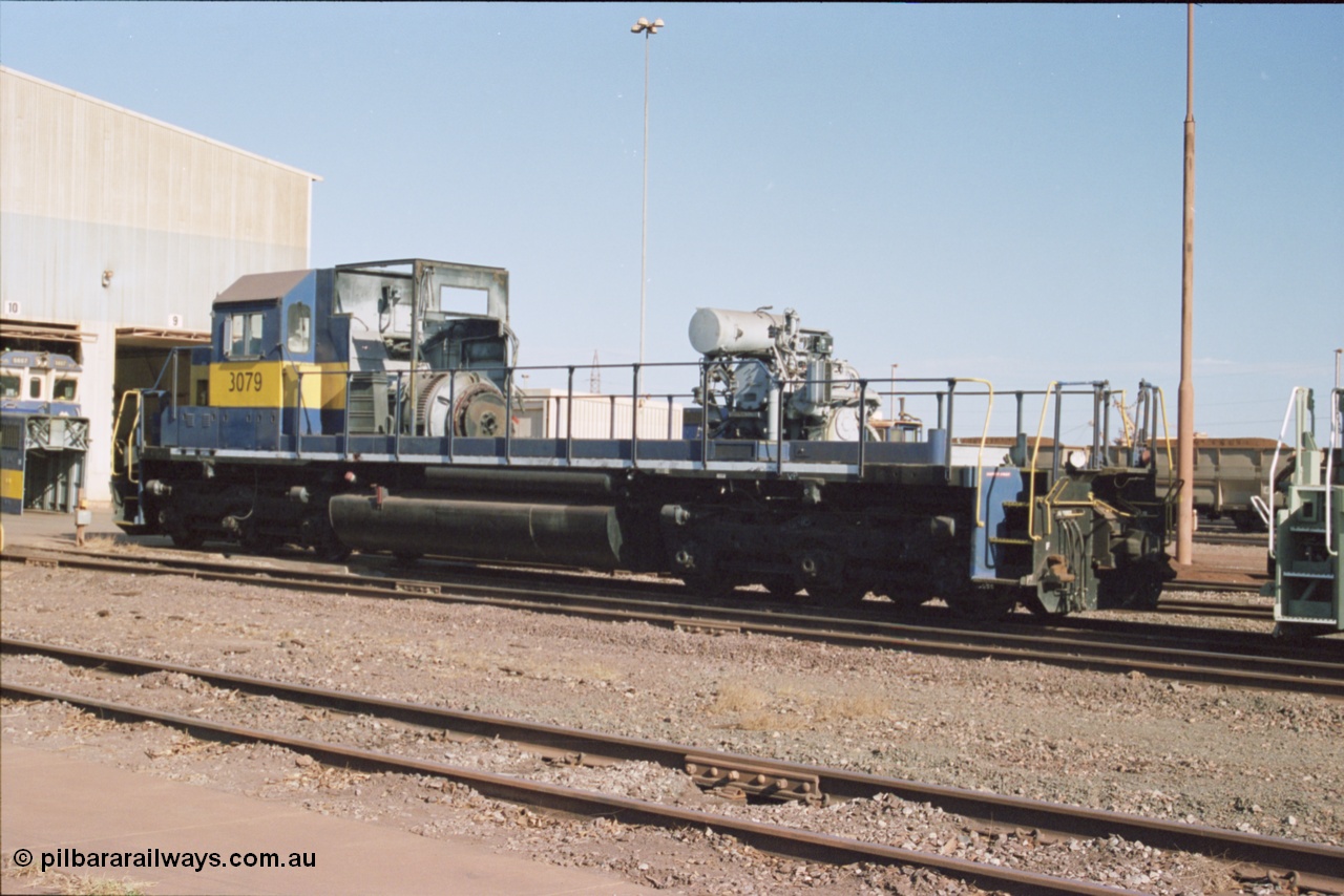 238-20
Nelson Point loco overhaul shop sees former Southern Pacific loco 3079 EMD model SD40, serial number 7861-52 with the long hood removed due to the 645 prime mover failing not long after arrival in Australia. 27th January 2004. [url=https://goo.gl/maps/rqoN9uK26rQ2] Geodata [/url].
Keywords: 3079;EMD;SD40;31542/7861-52;SP8461;