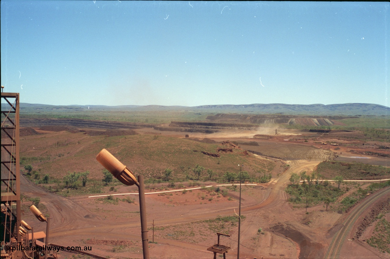 239-04
Overview looking south west from the radial stacker towards the Yandi One mine pit. [url=https://goo.gl/maps/hApNXoLtbtQ2]GeoData[/url].
