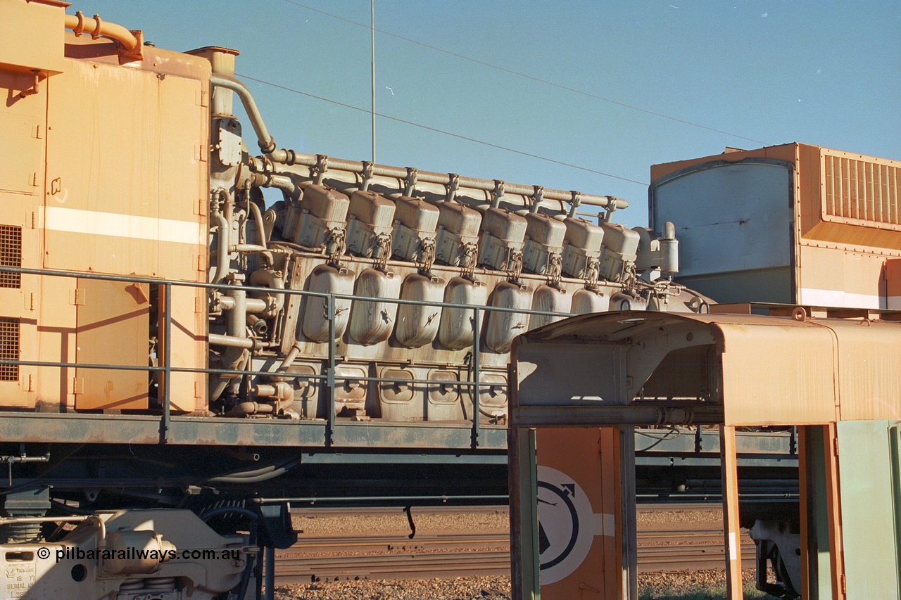 240-05
Nelson Point, retired Mt Newman Mining Comeng NSW built ALCo M636 unit 5499 serial C6096-4 sits with the hood removed exposing the ALCo 251F engine prior to removal and being sent by road to Rail Heritage WA's Bassendean museum for preservation. 25th June 2002.
Keywords: 5499;Comeng-NSW;MLW-ALCo;M636;C6096-4;251F;