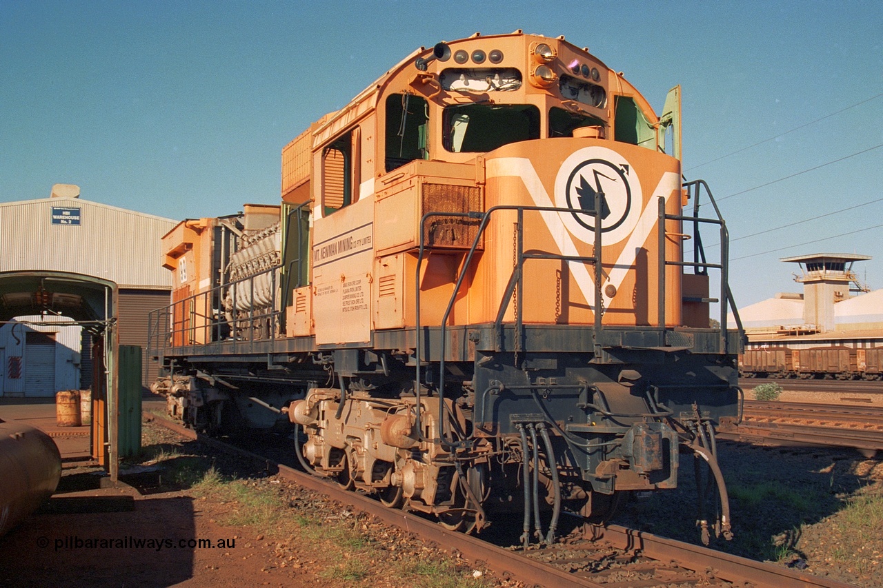 240-09
Nelson Point, retired Mt Newman Mining Comeng NSW built ALCo M636 unit 5499 serial C6096-4 sits awaiting its engine removal prior to being sent by road to Rail Heritage WA's Museum at Bassendean, Perth for preservation. 25th June 2002.
Keywords: 5499;Comeng-NSW;MLW-ALCo;M636;C6096-4;